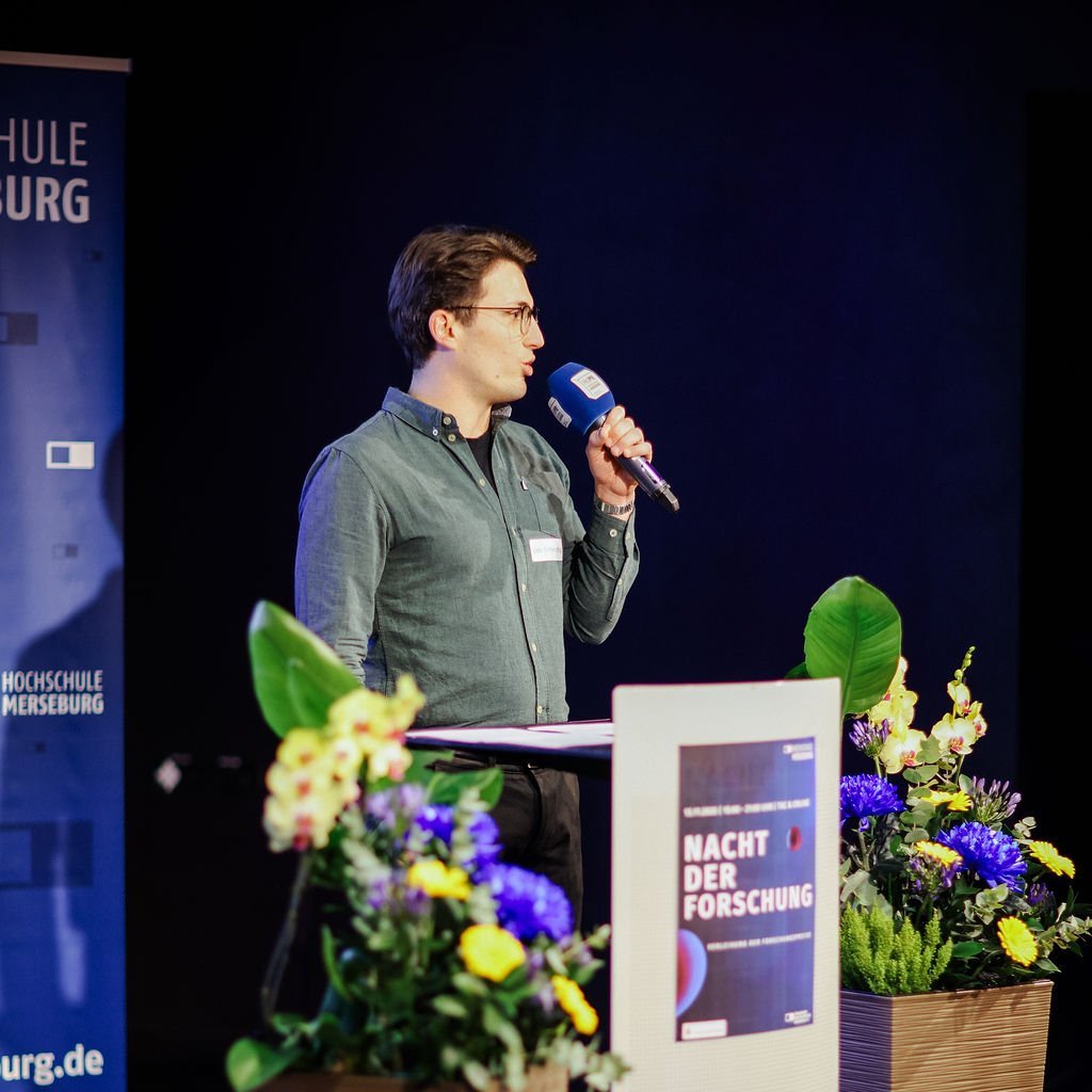 Udo Scheinpflug hält seinen Pitch für den Forschungspreis.